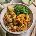 Healthy Tuna Grain Bowl with Turmeric Sweet Potatoes and Spicy Yogurt Dressing