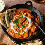 Murgh Makhani (Indian Butter Chicken) w/ fresh peas and basmati