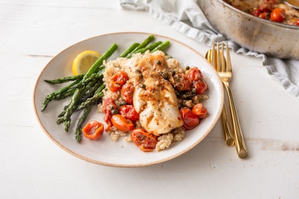 White Fish with Rich Tomato Sauce side Boiled Potatoes and Asparagus
