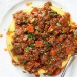 Hearty Italian Meat Ragu on a Bed of Polenta