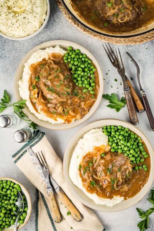 Hamburger Steak w/onions, Mashed potatoes and side Peas & Onions