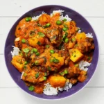 Cari d’Agneau aux Pommes de Terre & Petits Pois