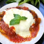 Chicken Parmigiana with Potato, Tomato & Onion Salad