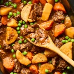 Tender Beef Stew with Potatoes, Carrots and Peas